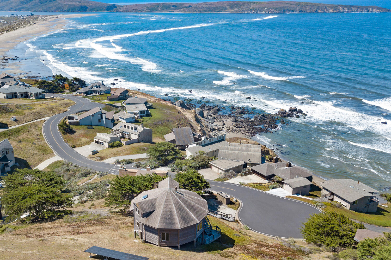 An aerial photo of a beach house.